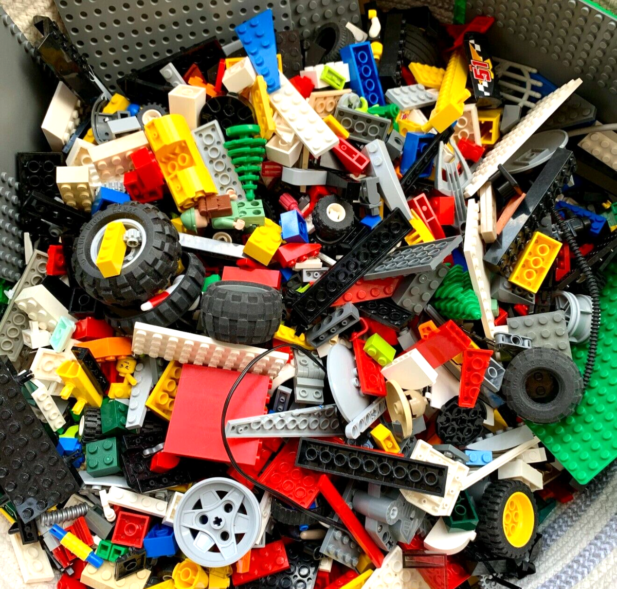 LEGOS 18 LBS of assorted legos lots of wheels trees figurines base