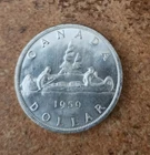 1959 uncirculated Canadian 80% silver dollar