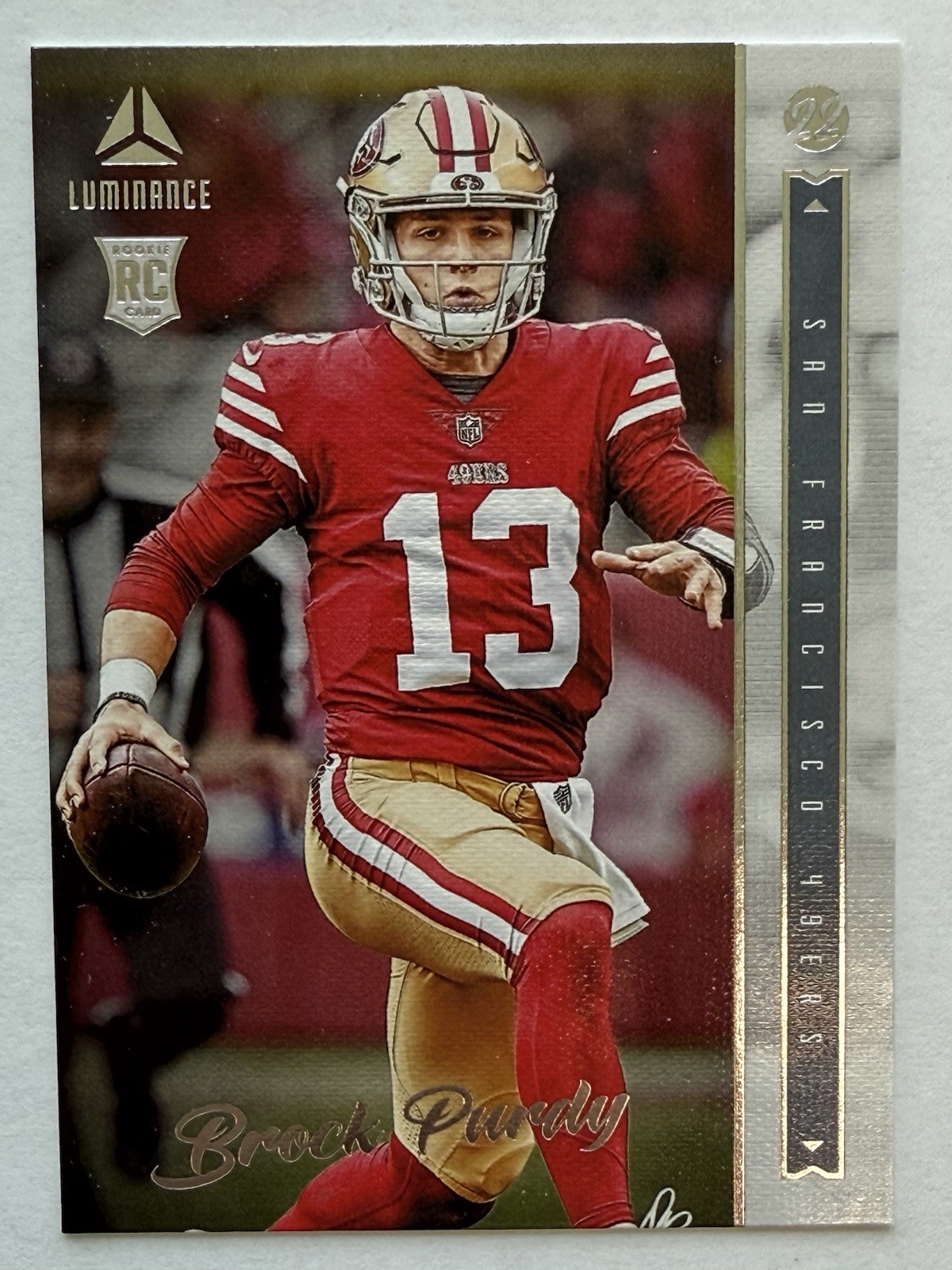 2022 Panini Chronicles - Luminance Update Rookies Brock Purdy #213 (RC)