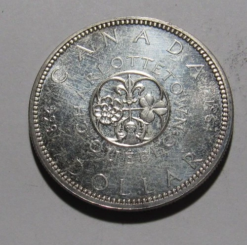 1964 Canada Silver Dollar — photo from another recent sale