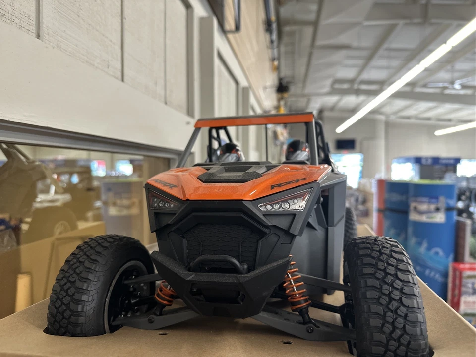 Camiones eléctricos listos para usar Losi 1/10 RZR Rey 4x4 sin escobillas - naranja Foto 2 de 4