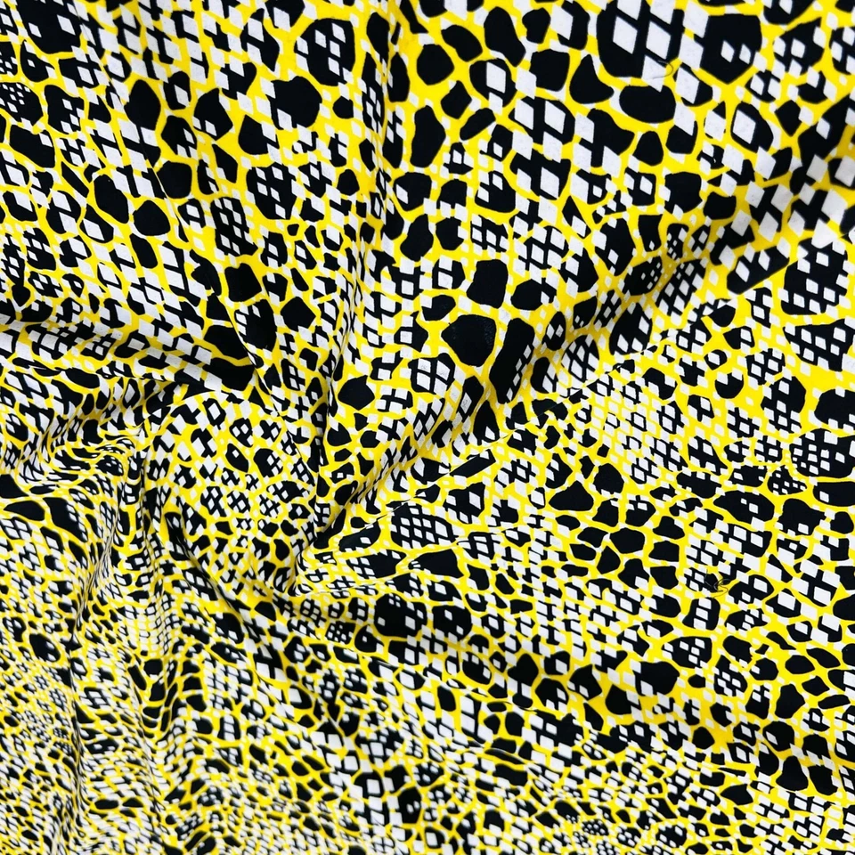 Tela de spandex de nailon con estampado amarillo animal 60" de ancho por yarda para trajes de baño Foto 4 de 4