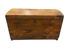 Antique dome top travel trunk 
