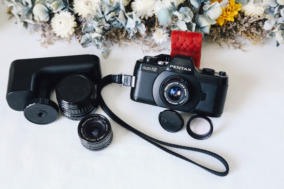 PENTAX Auto110 SLR Film Camera w/ 3 Lenses 18/2.8 24/2.8 50/2.8