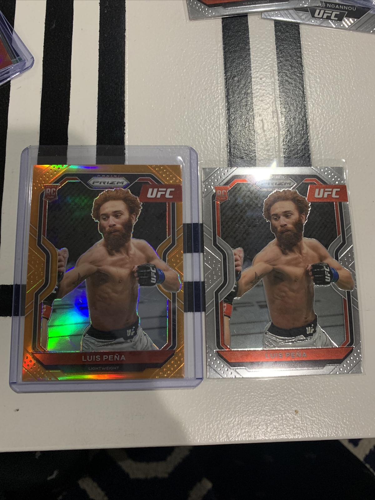 2021 Prizm UFC Debut Edition Luis Pena Rookie Orange Holo #27 #d/99 and Base