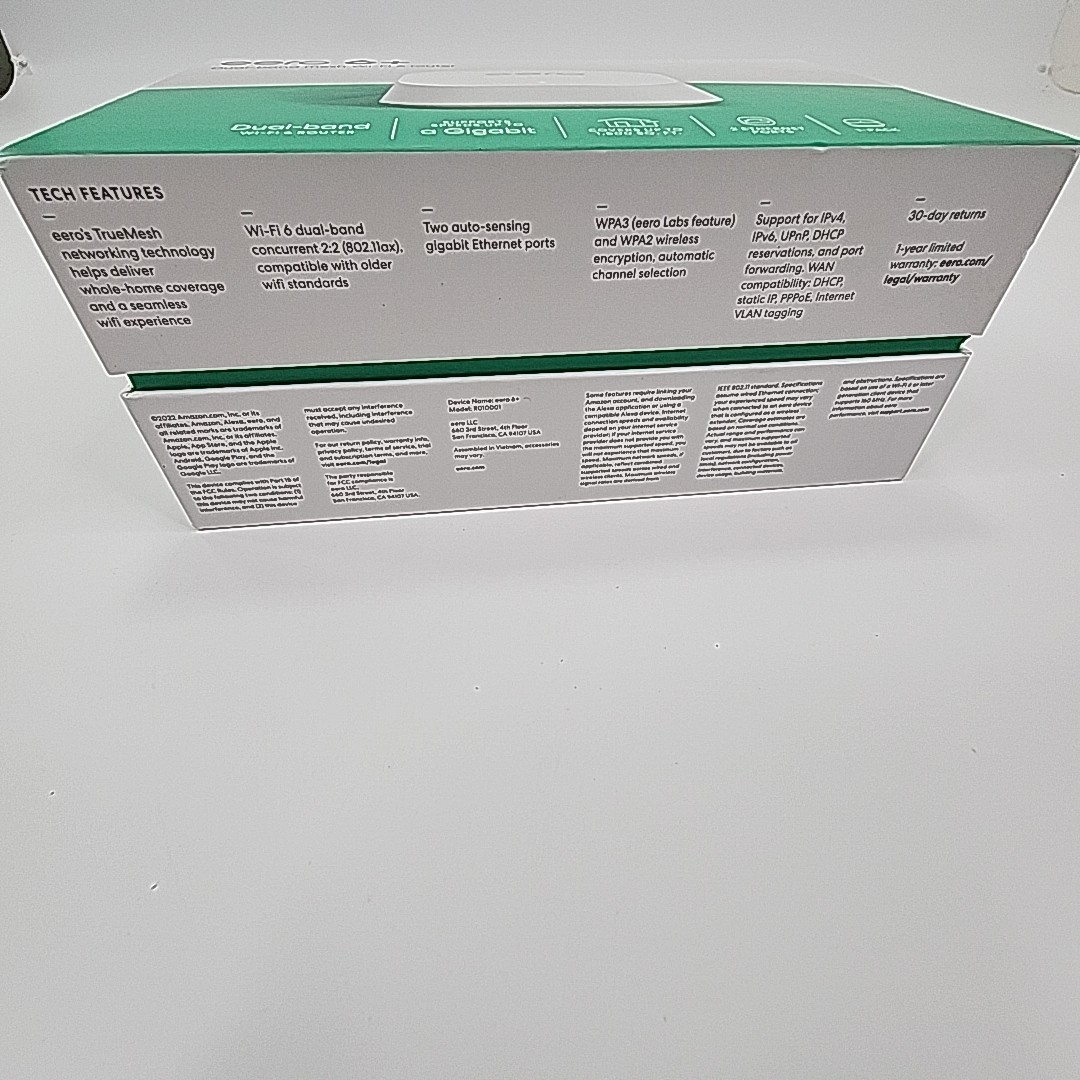 White box of Eero 6+Plus Dual Band Mesh WiFi Router with teal top and visible rear Ethernet ports.