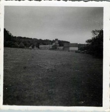 WW2 Photo of Burned Church Ruins with Field and Trees in Background