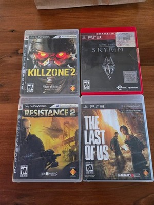 Lot of 4 PS3 Games KILLZONE 2 SKYRIM RESISTANCE 2 LAST OF US