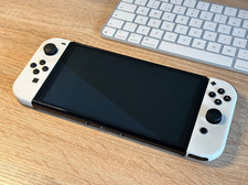 Nintendo Switch OLED + Game + Hard Case