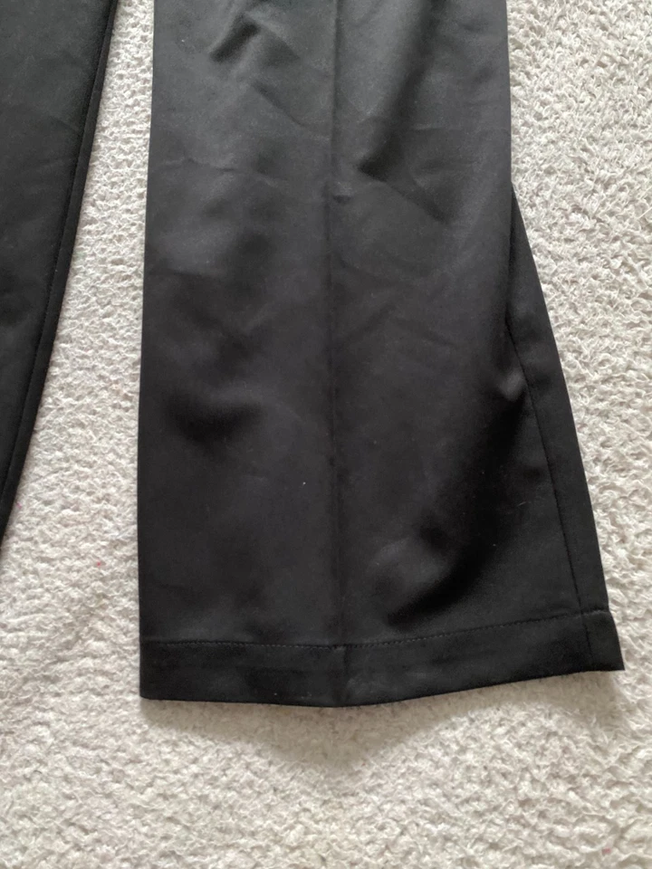 Pantalones rectos Haggar Performance Cool 18 calce clásico para hombre negros talla 42 x 29 Foto 2 de 4