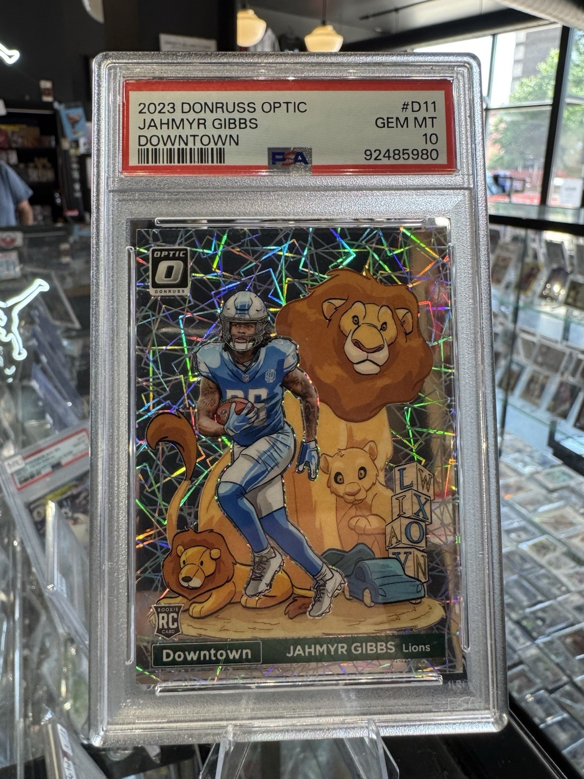 Jahmyr Gibbs Panini Donruss Optic Downtown #D11 Base
