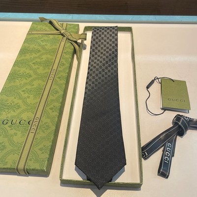 Gucci Men's Black Logo Pattern Designer Tie with GG Logo Accent Theme