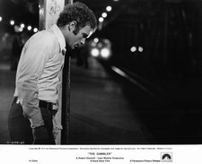 James Caan leaning against post at train station from the film The- Old Photo