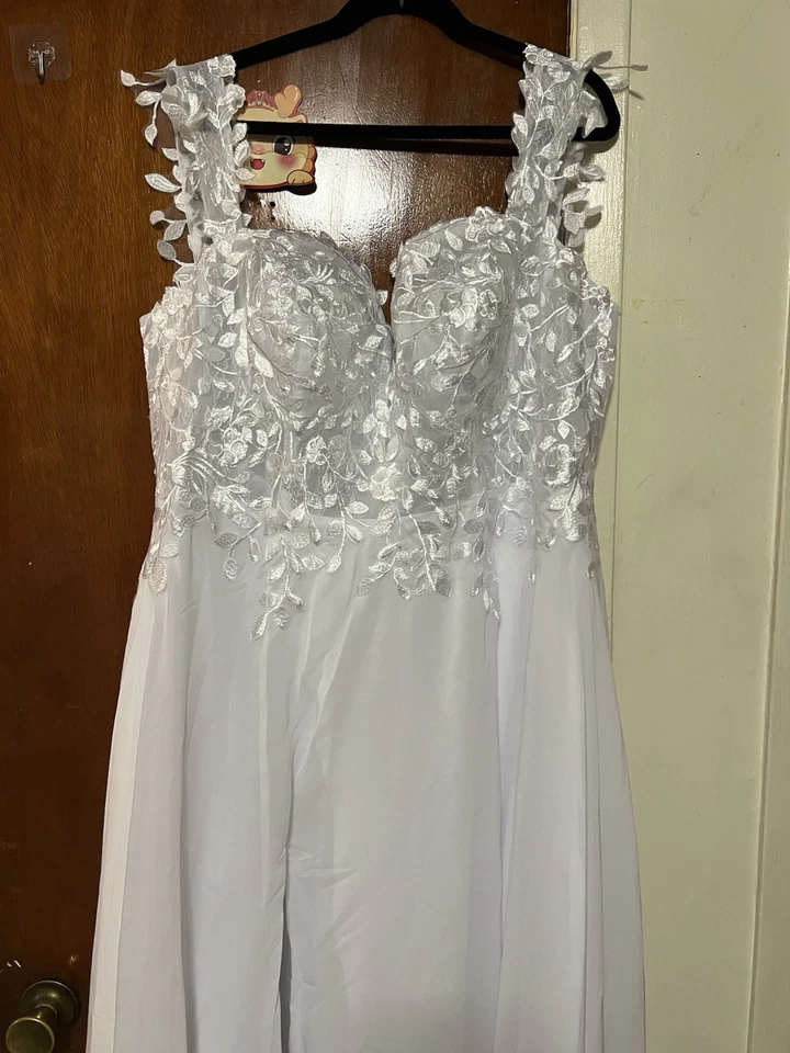 Vestido de novia blanco sin mangas Foto 2 de 4