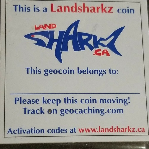EXC 2010 Cachin' Crow Palsns LANDSHARKZ Geocoin con código de sitio de activación - Imagen 2 de 3