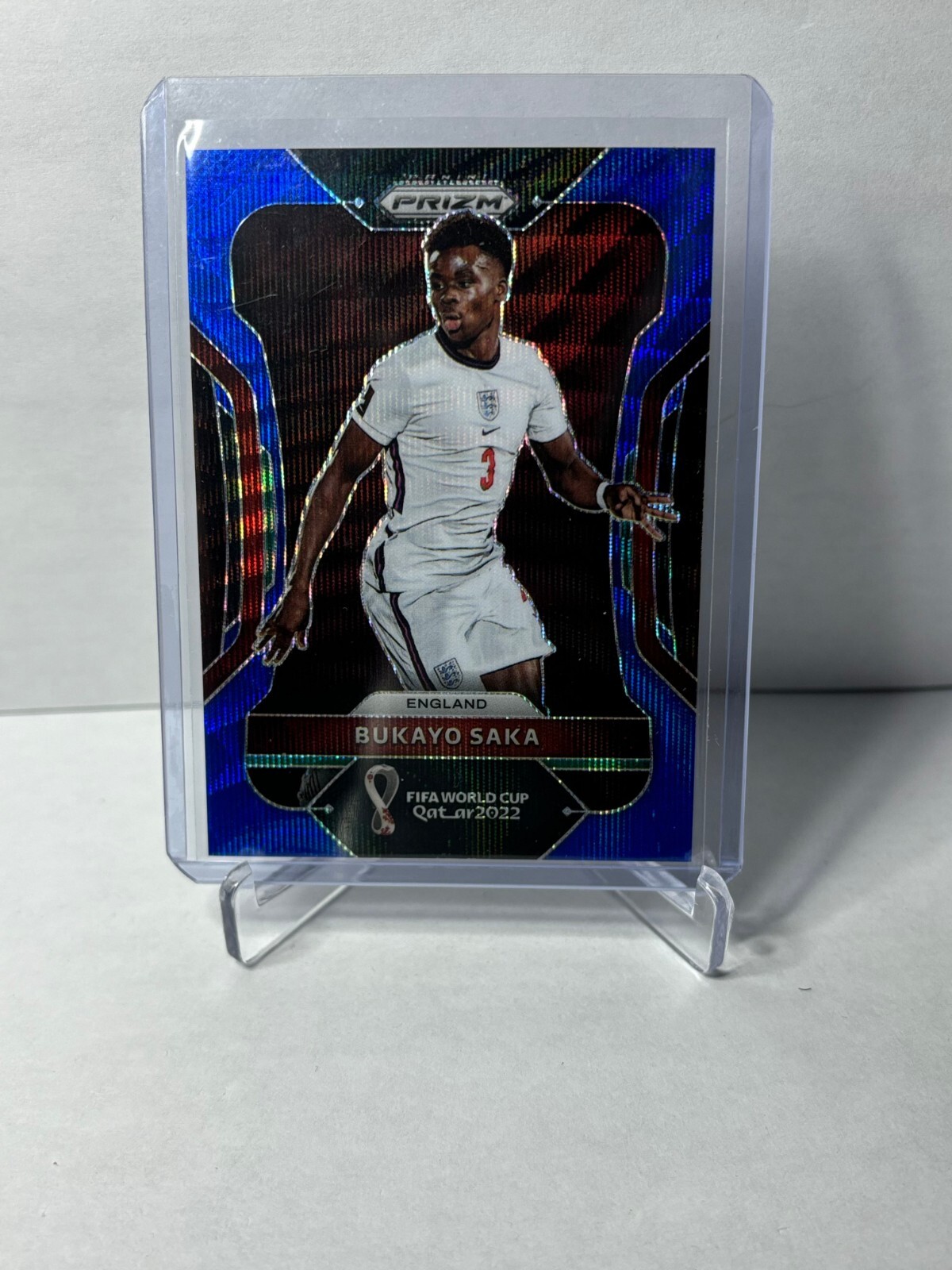 2022 Panini Prizm FIFA World Cup Qatar BUKAYO SAKA Blue Wave /199 #84 England