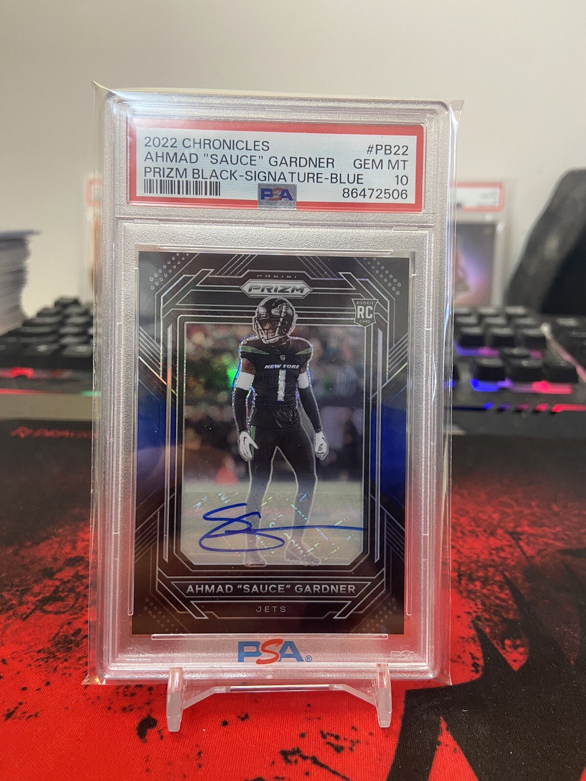 2022 Panini Chronicles Football Ahmad Gardner Prizm Black Blue Auto /25 PSA 10