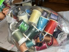 Multiple Spools Of Thread For Sewing Many Colors With A Couple Tools