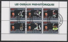 Timbres sur les dinosaures - Feuillet de timbres de Côte d'Ivoire - TBE