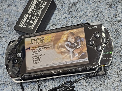 PSP funzionante PES 6 batteria da sostituire - Foto 1 di 3