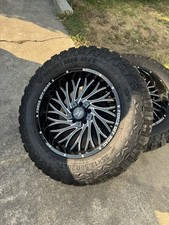 35 Inch Tires with 20 Inch Rims Set of 5 Used for 6 Months Missing Two Caps