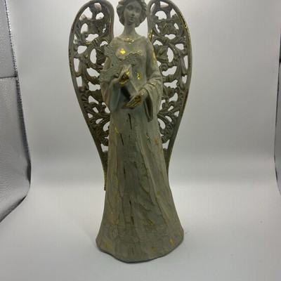 Angel Holding A Cross 