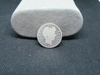 UNITED STATES SILVER COIN QUARTER 1899 BARBER !