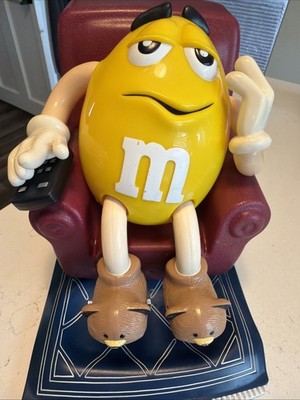 M&M's Yellow Character Sitting in Chair Advertising Display Candy & Nuts Theme