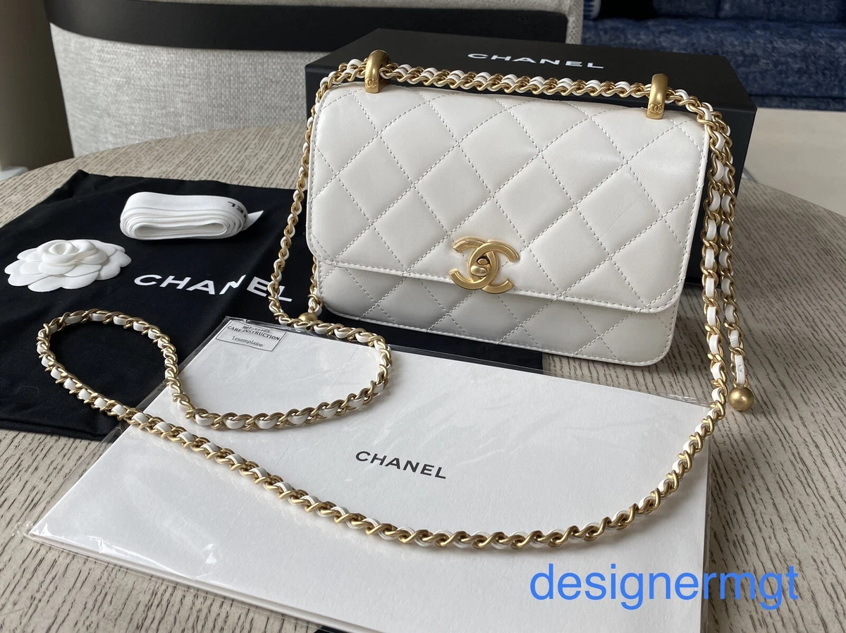 white flap bag chanel