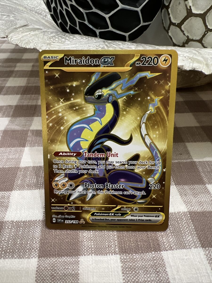 $33 Miraidon Ex Gold scarlet violet pokemon, Hobbies & Toys, Toys & Games  on Carousell