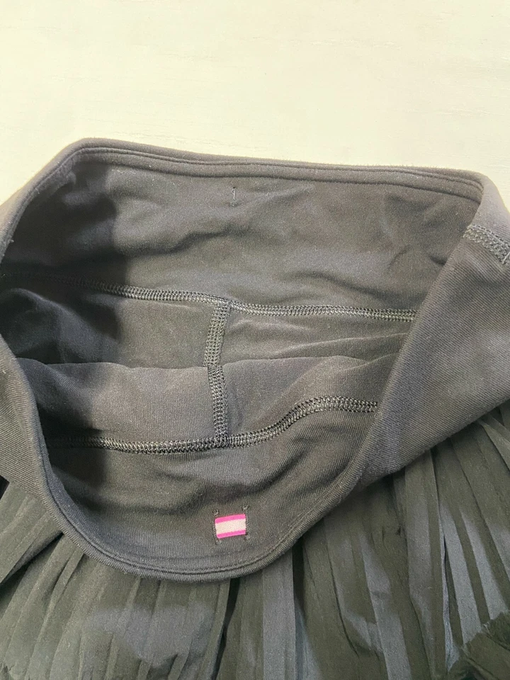 Pantalones Cortos Niñas IVIVVA Negros Forrados Sprint Completo Plisado Skort Talla 12 Foto 4 de 4