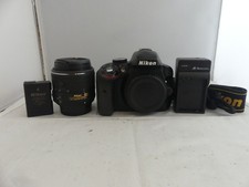 Nikon D D3300 24.2MP w/ AF-S DX VR II 18-55mm. Looks and works great.