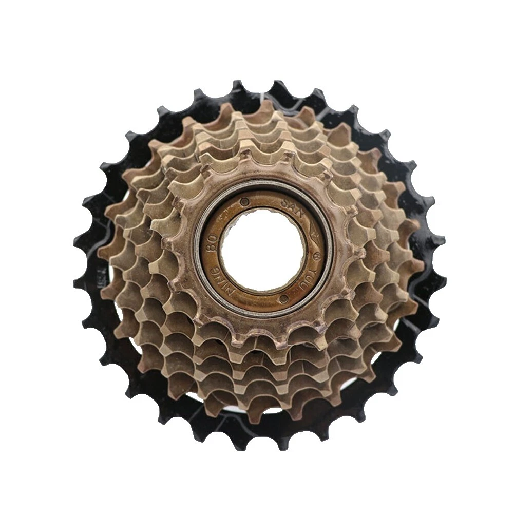 Casetes de bicicletas marrón, ruedas libres y dientes