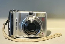 Canon PowerShot A560 Silver 7.1MP 4X Optical Zoom Built-in Flash Digital Camera