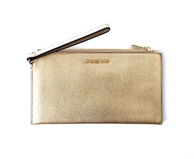 MICHAEL KORS Clutch JET SET TRAVEL LG TZ WRISTLET Leder pale gold - Bild 1 von 4