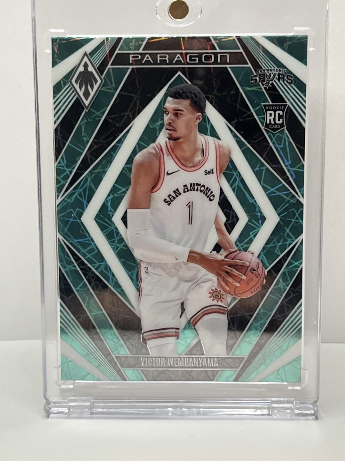 2023-24 Panini Phoenix Paragon Teal Laser #13 Victor Wembanyama RC Rookie SP