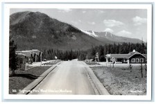 c1950's Highway Thru Coca Cola West Glacier Montana MT RPPC foto cartolina