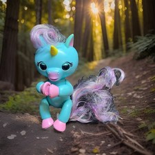 Wowee Fingerlings Interactive Baby Unicorn Gemma - Blue with Pink Hair - Works
