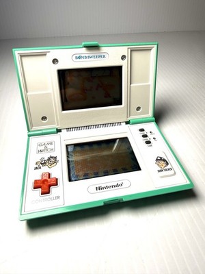 Vintage Nintendo Game And Watch Bomb Sweeper handheld electronic game 1987
