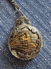 Pocket watch chain, silver metal w/ gold-tone train, needs new battery, quartz