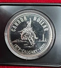 1975 Calgary Canadian Dollar - 50% Silver 50% Copper - Canada Commemorative