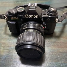 Canon AE-1 fotocamera reflex pellicola 35 mm con teleobiettivo attrezzatura f...