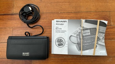 Sharp Wizard OZ-570 WITH DOCK Pocket Organizers Personal PDA Data Pocket 256 KB