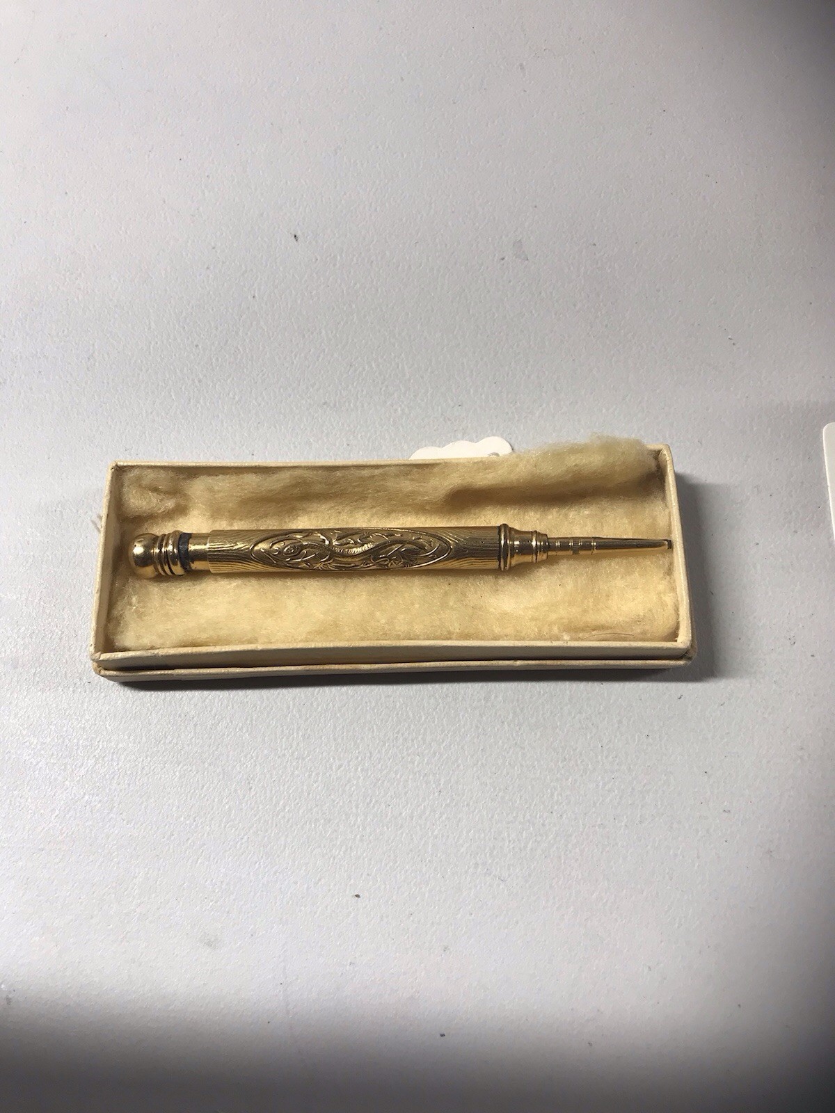 Gold Tone Mechanical Pencil.