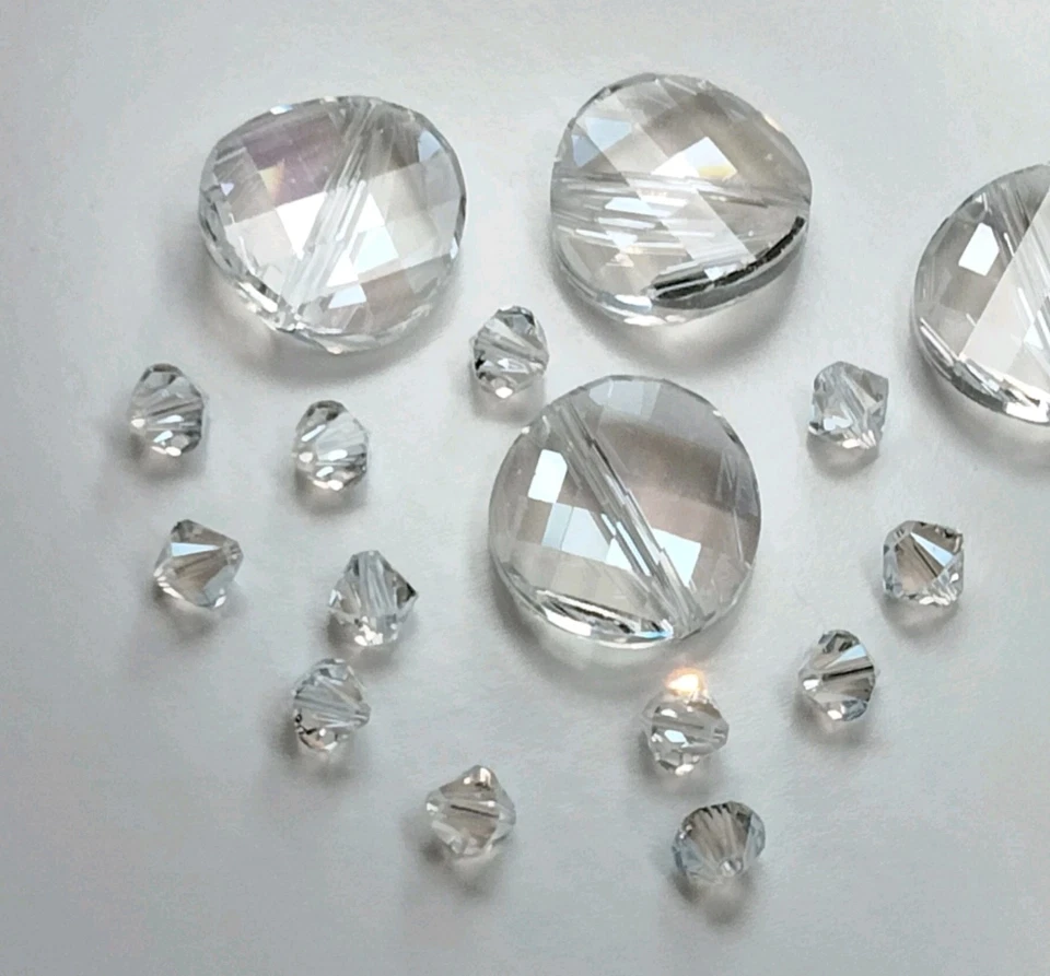 CRISTAL LUZ DE LUNA 4 (18mm) Swarovski 5621 cuentas de cristal y 12 (6mm) 5301 bicones  Foto 2 de 4