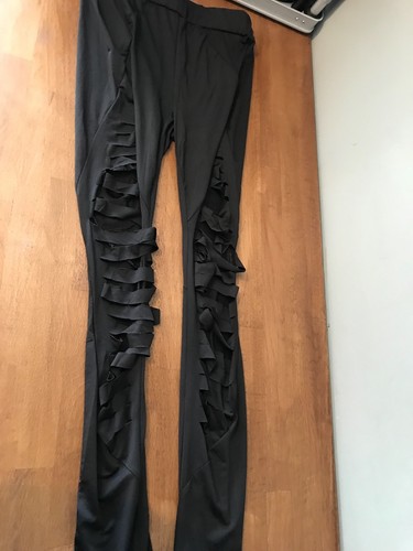 leggings neri con strappi taglia 8. PICCOLO - Foto 2 di 2