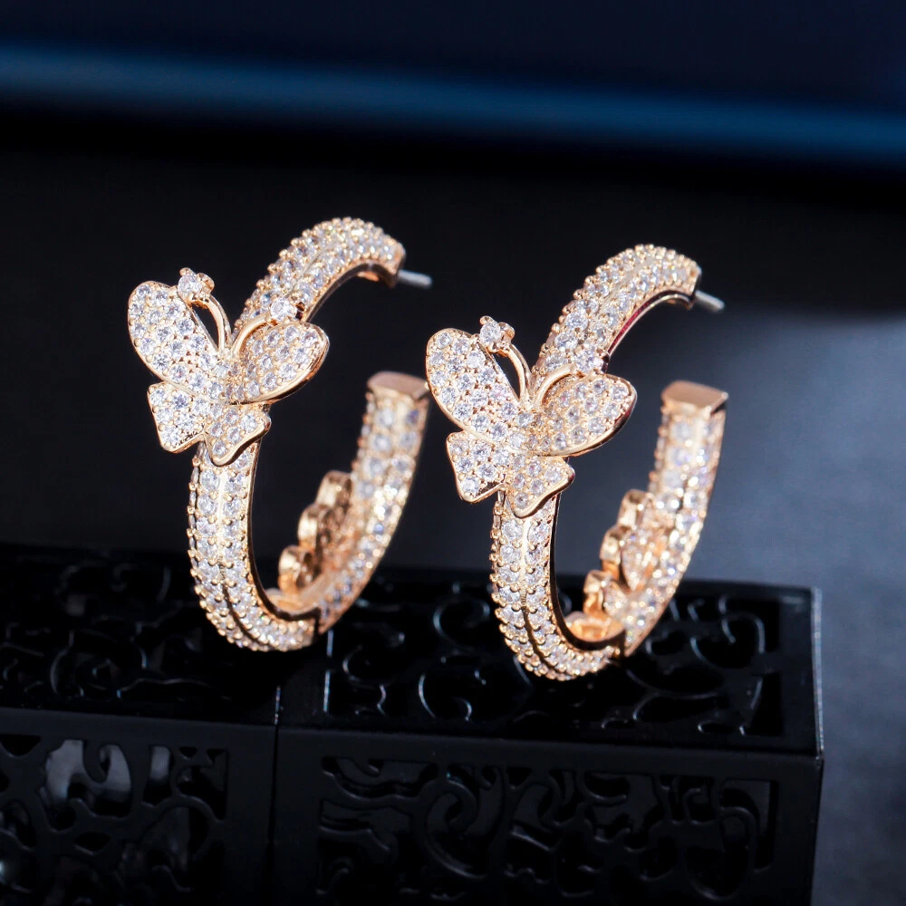 Gold hoop on sale earrings with butterfly