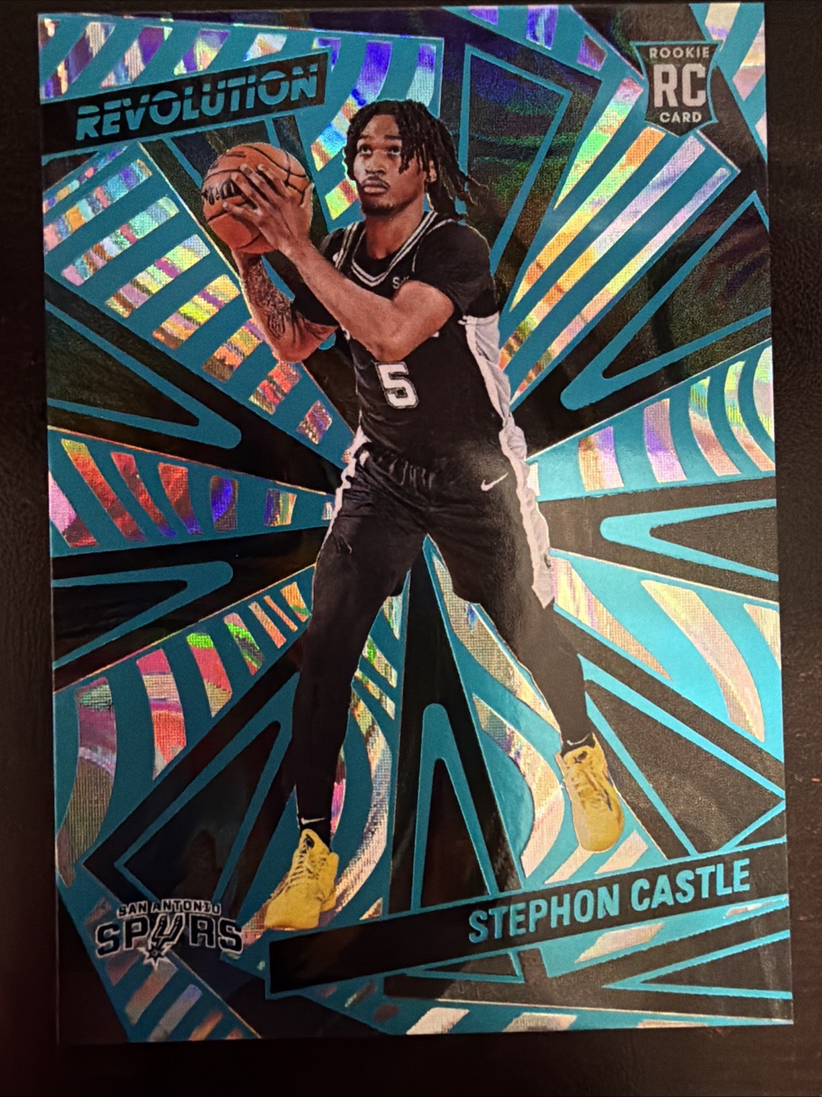 2024-25 Panini Revolution Stephon Castle #116 Teal Swirl #/49 RC Spurs