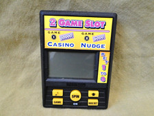 Radica: 2 Game Slot Electronic Handheld Game Model 1374 TESTED
