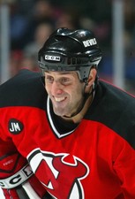 Jay Pandolfo New Jersey Devils watches the puck at a game v - Ice Hockey Photo